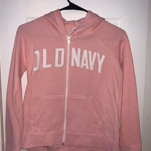 Baby pink and baby green sweaters